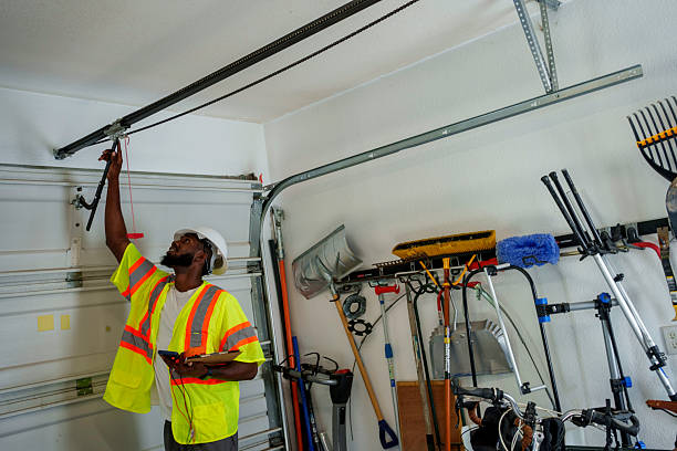Professional Garage Door Opener Repair technician working in Otterbein, IN